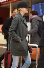EMMA STONE at Heathrow Airport in London 03/26/2018