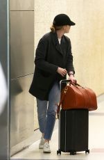 EMMA STONE at Heathrow Airport in London 03/26/2018