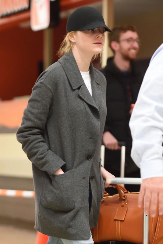 EMMA STONE at JFK Airport in New York 03/26/2018