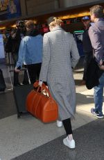 EMMA STONE at Los Angeles International Airport 03/05/2018