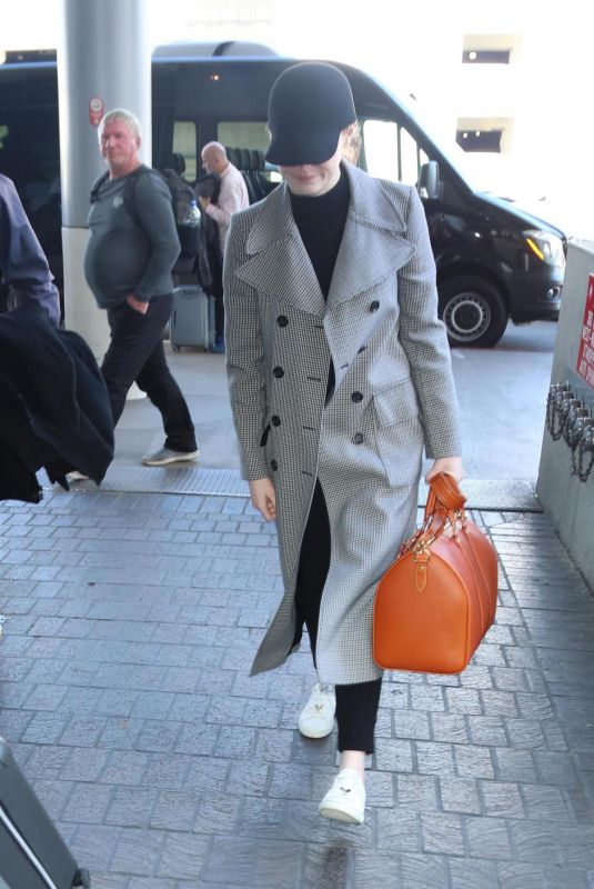 EMMA STONE at Los Angeles International Airport 03/05/2018