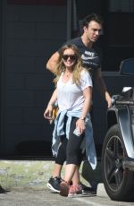 HILARY DUFF with Her Trainer at a Gym in Beverly Hills 03/05/2018