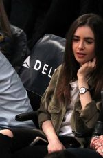 LILY COLLINS at Lakers Game at Staples Center in Los Angeles 03/28/2018