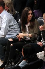 LILY COLLINS at Lakers Game at Staples Center in Los Angeles 03/28/2018