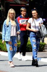 LOTTIE MOSS and EMILY BLACKWELL in Ripped Jeans Shopping at The Grove in Los Angeles 03/23/2018