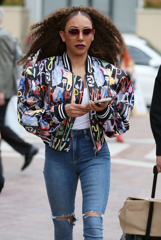 MELANIE BROWN Arrives at America