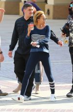 MELANIE BROWN Arrives at America