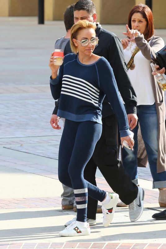 MELANIE BROWN Arrives at America