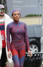 MELANIE BROWN in 20-Year Old Spice Girl Outfit Heading to America