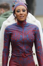 MELANIE BROWN in 20-Year Old Spice Girl Outfit Heading to America