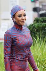 MELANIE BROWN in 20-Year Old Spice Girl Outfit Heading to America