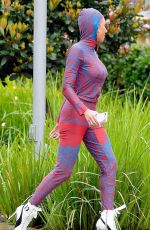 MELANIE BROWN in 20-Year Old Spice Girl Outfit Heading to America