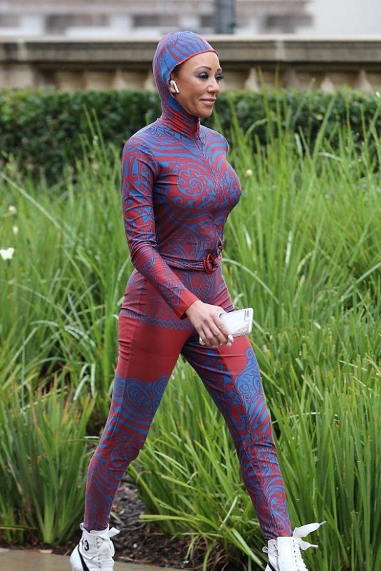 MELANIE BROWN in 20-Year Old Spice Girl Outfit Heading to America
