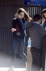 MILA KUNIS Our with a Friend in Los Angeles 03/26/2018