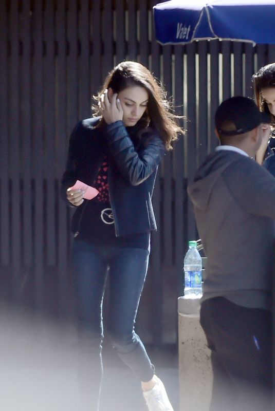 MILA KUNIS Our with a Friend in Los Angeles 03/26/2018