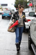 MILLA JOVOVICH Leaves a Wax Salon in Los Angeles 03/22/2018