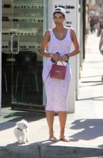 NICOLE MURPHY in Tight Dress Out with Her Dog in Beverly Hills 03/28/2018