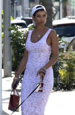 NICOLE MURPHY in Tight Dress Out with Her Dog in Beverly Hills 03/28/2018