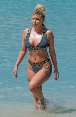 OLIVIA BUCKLAND and Alex Bowen on Vacation in Barbados 03/19/2018