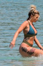 OLIVIA BUCKLAND and Alex Bowen on Vacation in Barbados 03/19/2018