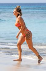 OLIVIA BUCKLAND in a Orange Bikini at a Beach in Barbados 03/13/2018