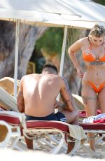 OLIVIA BUCKLAND in a Orange Bikini at a Beach in Barbados 03/13/2018