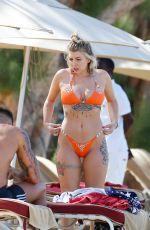 OLIVIA BUCKLAND in a Orange Bikini at a Beach in Barbados 03/13/2018