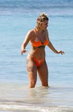 OLIVIA BUCKLAND in a Orange Bikini at a Beach in Barbados 03/13/2018
