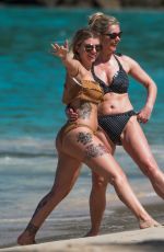 OLIVIA BUCKLAND in Bikini on the Beach in Barbados 03/16/2018