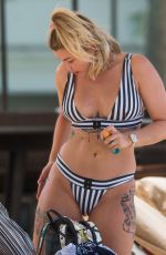 OLIVIA BUCKLAND in Bikini on Vacation in Barbados 03/17/2017