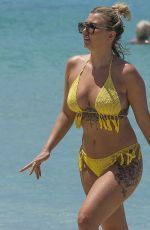 OLIVIA BUCKLAND in Bikini on Vacation in Barbados 03/20/2018