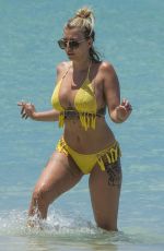 OLIVIA BUCKLAND in Bikini on Vacation in Barbados 03/20/2018