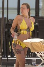 OLIVIA BUCKLAND in Bikini on Vacation in Barbados 03/20/2018