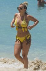 OLIVIA BUCKLAND in Bikini on Vacation in Barbados 03/20/2018