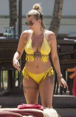 OLIVIA BUCKLAND in Bikini on Vacation in Barbados 03/20/2018
