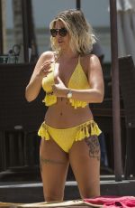 OLIVIA BUCKLAND in Bikini on Vacation in Barbados 03/20/2018