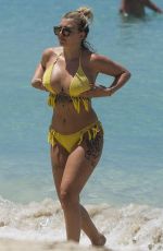 OLIVIA BUCKLAND in Bikini on Vacation in Barbados 03/20/2018