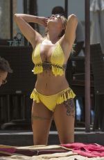 OLIVIA BUCKLAND in Bikini on Vacation in Barbados 03/20/2018