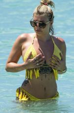 OLIVIA BUCKLAND in Bikini on Vacation in Barbados 03/20/2018