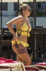 OLIVIA BUCKLAND in Bikini on Vacation in Barbados 03/20/2018