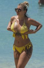OLIVIA BUCKLAND in Bikini on Vacation in Barbados 03/20/2018
