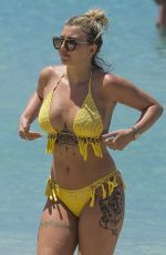 OLIVIA BUCKLAND in Bikini on Vacation in Barbados 03/20/2018