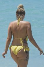 OLIVIA BUCKLAND in Bikini on Vacation in Barbados 03/20/2018