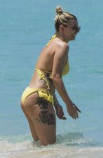 OLIVIA BUCKLAND in Bikini on Vacation in Barbados 03/20/2018