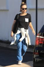 OLIVIA WILDE Leaves Hugo