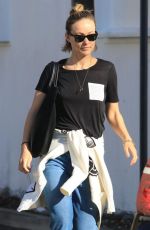 OLIVIA WILDE Leaves Hugo