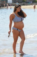 Pregnant CASEY BATCHELOR in Biikini at a Beach in Tenerife 03/15/2018