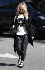 ROSANNA ARQUETTE Out and About in Beverly Hills 03/20/2018