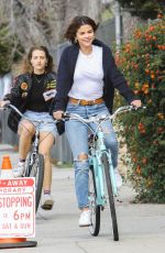 SELENA GOMEZ Riding a Bike Out in Studio City 03/16/2018