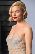 SIENNA MILLER at 2018 Vanity Fair Oscar Party in Beverly Hills 03/04/2018